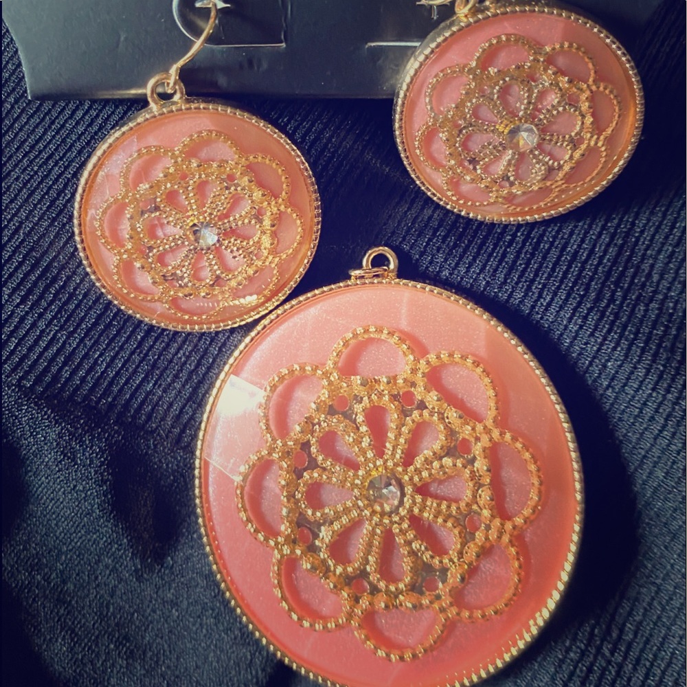TORRID EARRINGS/PENDANT. $21